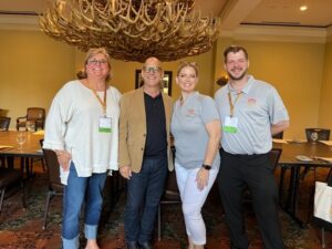 a group of people at the 48th annual state TAAP Conference